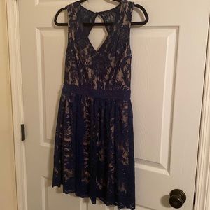 Francesca’s sleeveless lace blue dress size small, peek-a-boo back detail, lined